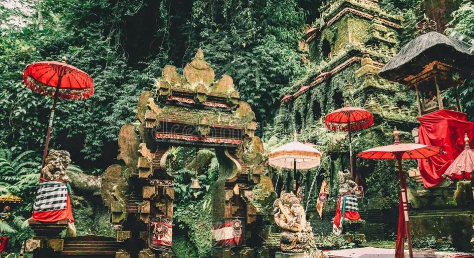 Jungle water temple with red ceremonial umbrellas